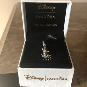 Mickey 90th anniversary charm.